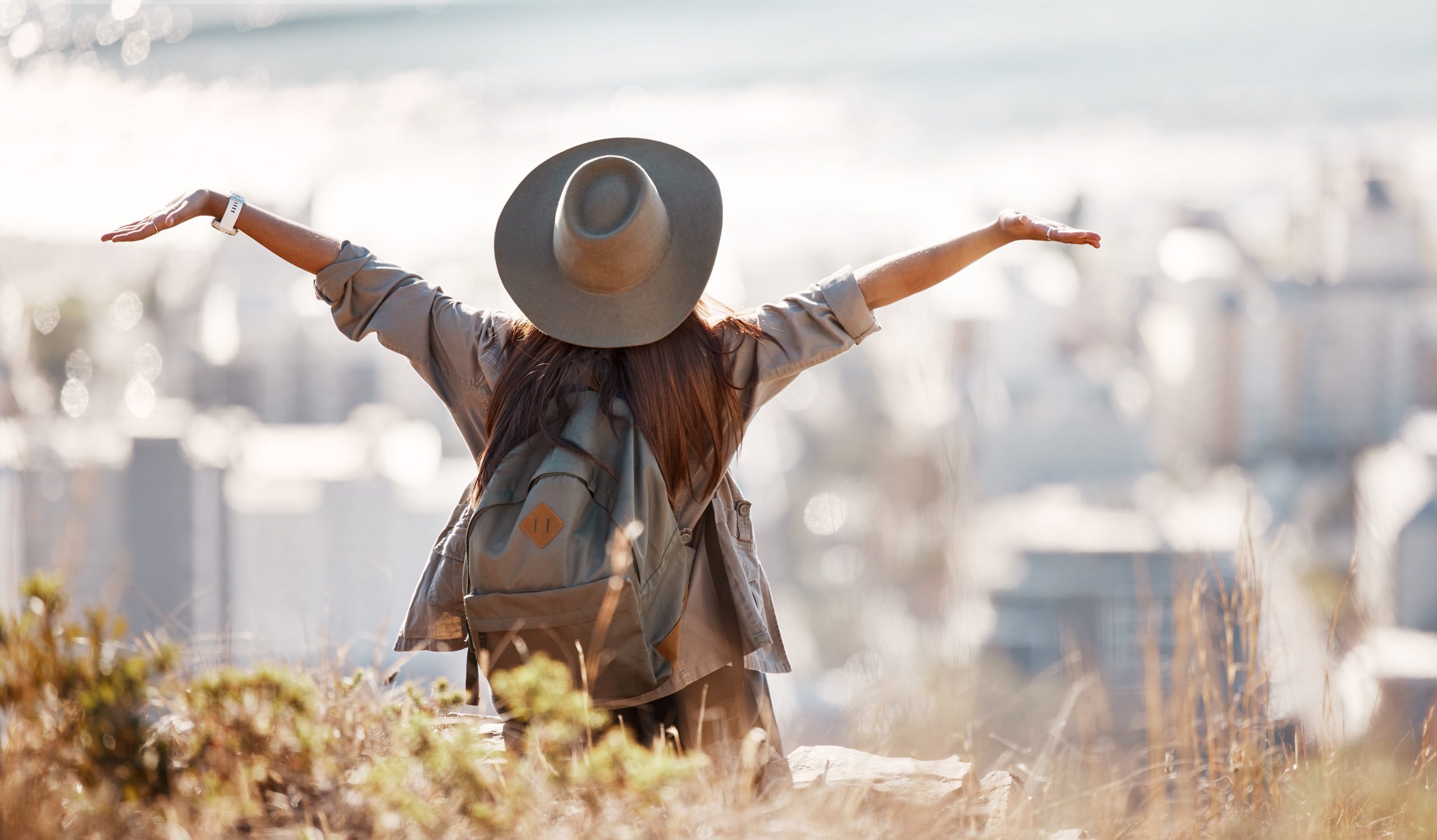 Woman Tourist Hiking Travel Freedom City Adventure Backpacking Journey Mountain Nature Female Hiker With Open Arms Enjoying Fresh Air Trekking Scenery Urban Town